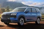Blue SUV in scenic landscape